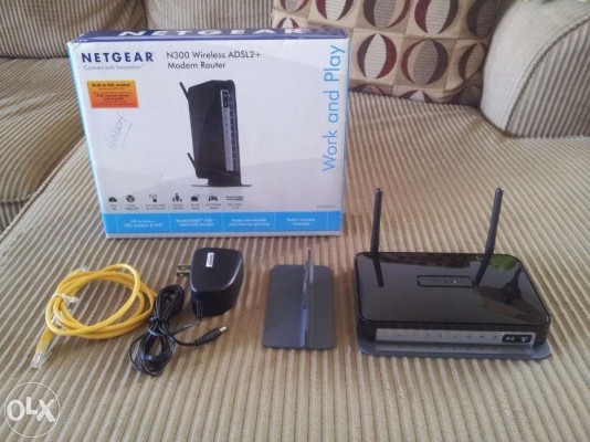 Netgear DGN2200 N300 Wireless Wi-Fi ADSL2+ Modem Router with Stand Bun